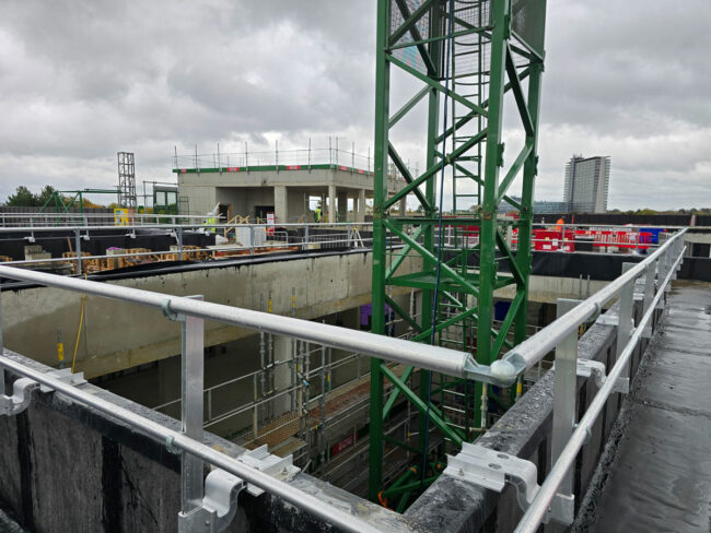 Dani-Alu Barrial Z permanent edge protection handrail installed on a UK healthcare project rooftop