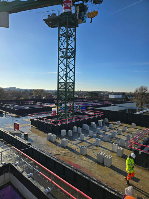 Dani-Alu Barrial Z permanent edge protection handrail installed on a UK healthcare project rooftop