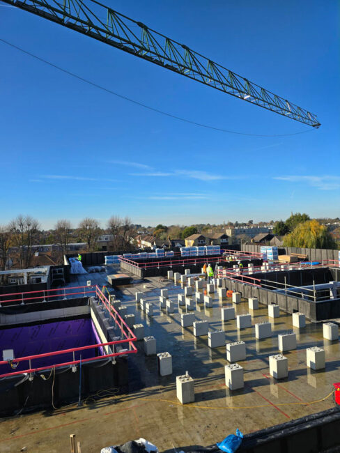 Dani-Alu Barrial Z permanent edge protection handrail installed on a UK healthcare project rooftop
