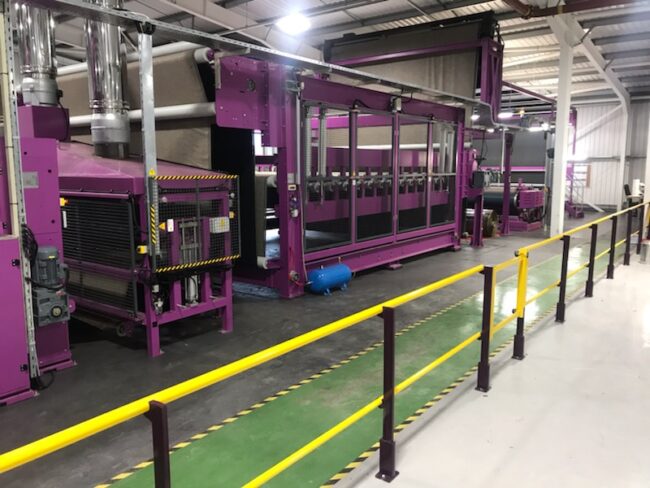 SIS_MBarrial M industrial safety barrier system installed within a manufacturing facility in Maryport, Cumbria Barrial M industrial safety barrier system installed within a manufacturing facility in Maryport, Cumbria, creating protected pedestrian walkways alongside operational machinery.